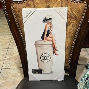 New a designer district studios Parisian Girl sitting on top of a coffee